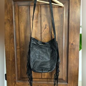 Cleobella black fringe leather purse.
